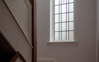 window installed photo from stairs landing - The Windows Co