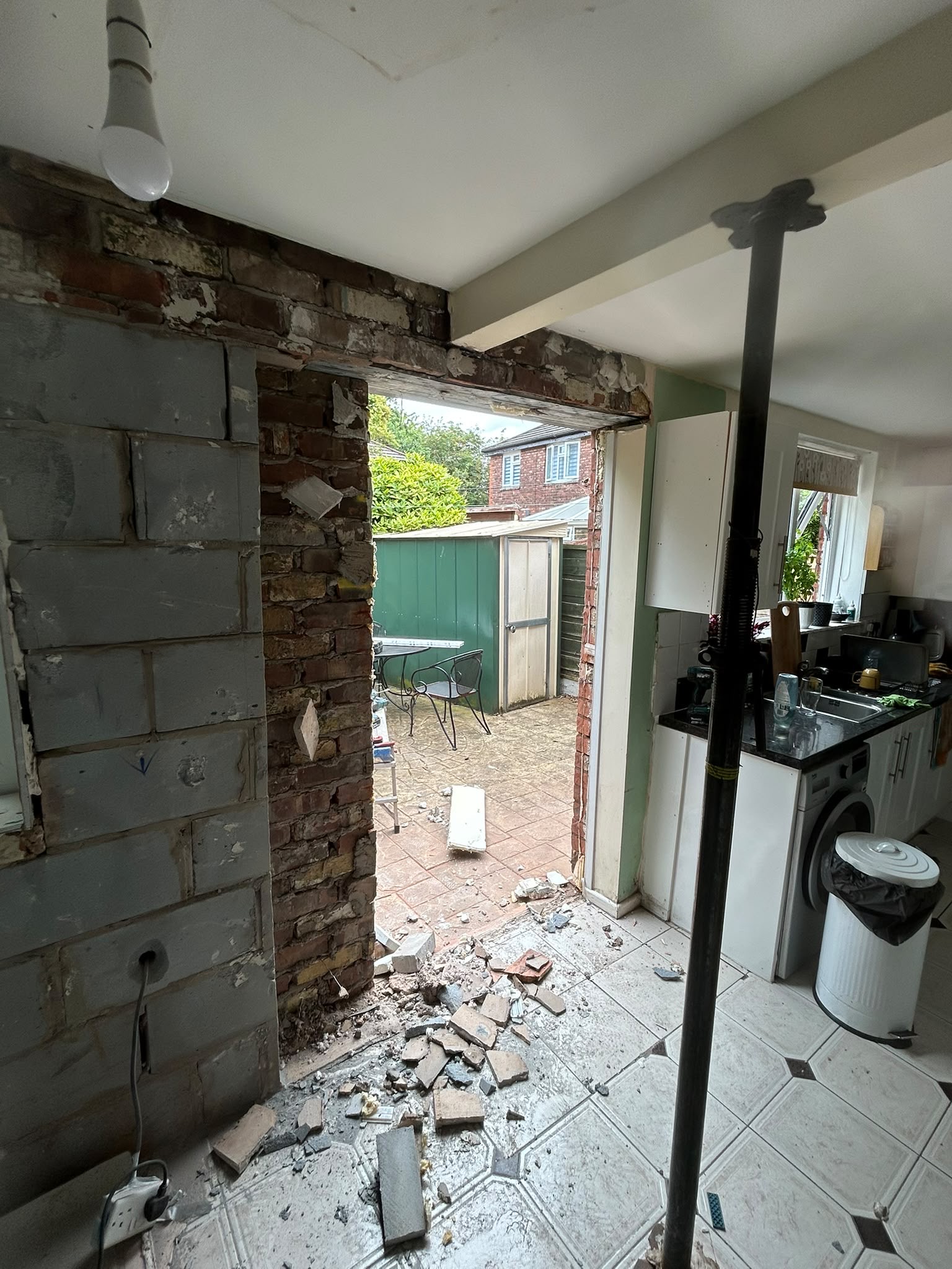 Internal view during structural alterations for new French doors