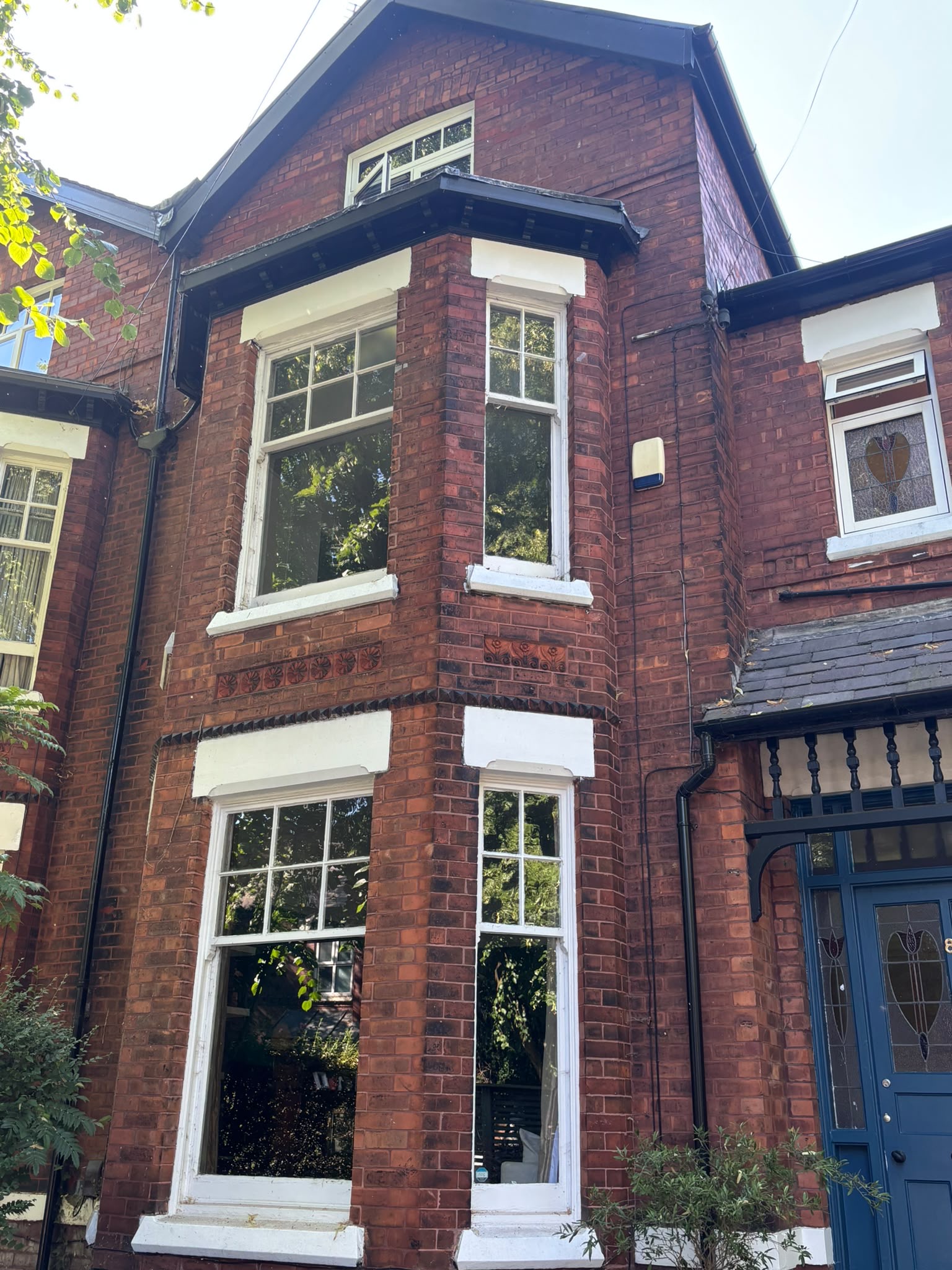 Original timber sash windows in a brick bay at a Chorlton period home