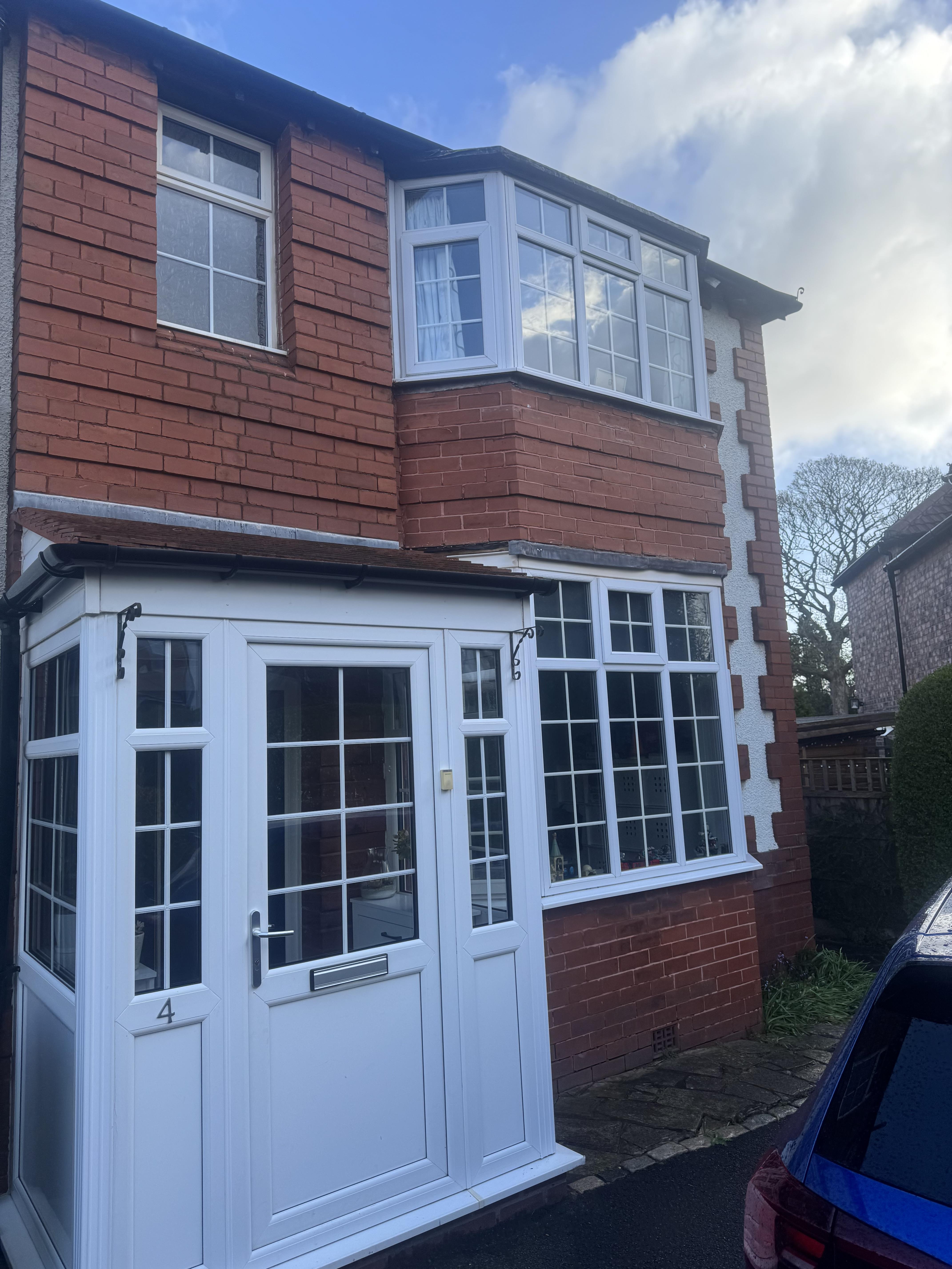 Front bay windows in Altrincham with Georgian bars before replacement