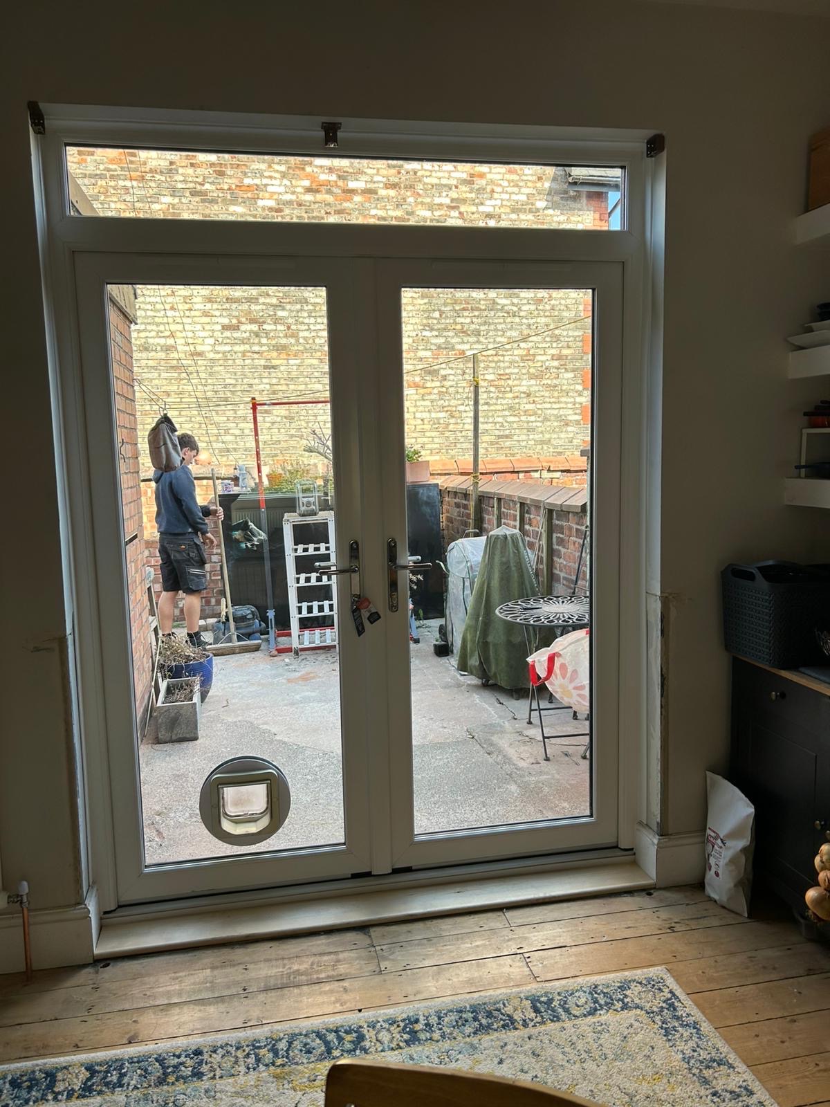 Internal view of newly installed French doors in Stretford home