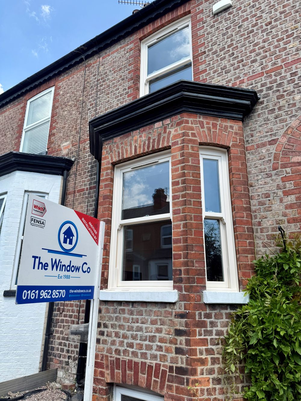 Victorian home in Altrincham after cream woodgrain uPVC sliding sash windows were installed
