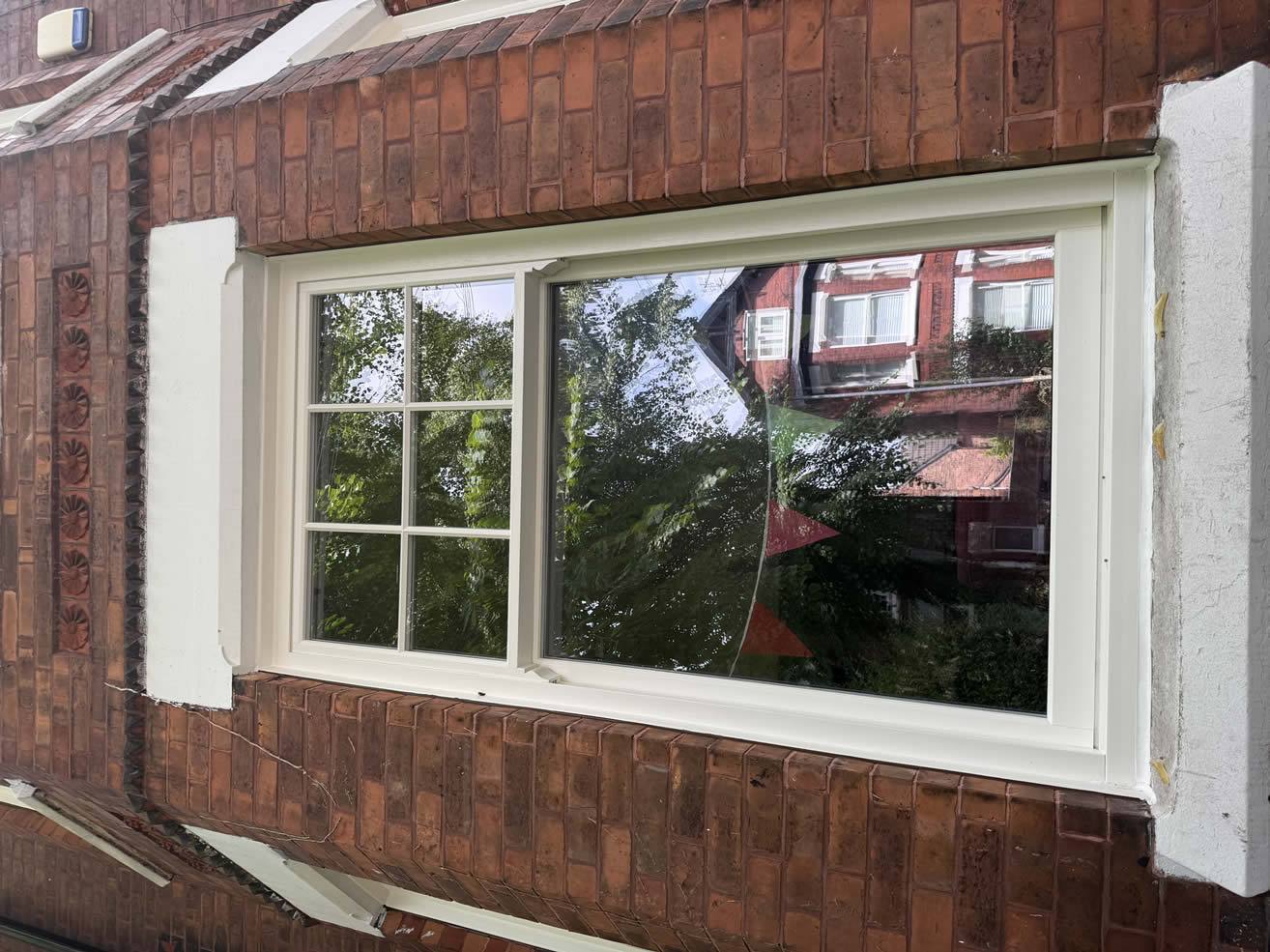 Close-up of a new white Roseview sash window fitted to a Chorlton period home