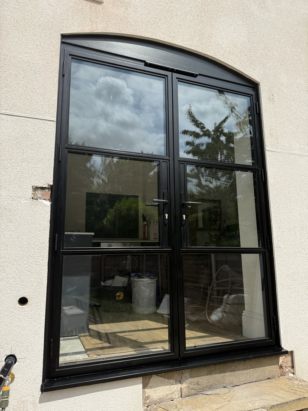 Dark heritage-style aluminium doors installed to rear of period home in Urmston